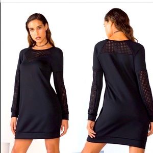 Fabletics black dress with mesh sleeve and yoke